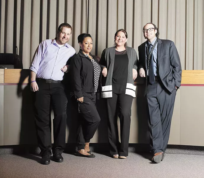 FROM LEFT: Blaine Stum, assistant to Councilman Breean Beggs; Anna Everano, assistant to Councilman Mike Fagan; Kaitlin Larson, assistant to Councilwoman Amber Waldref; and Adam McDaniel, assistant to Council President Ben Stuckart. - YOUNG KWAK