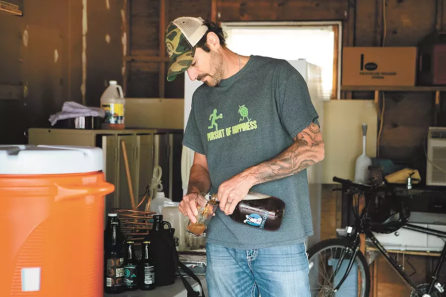 Inland Brewers Unite's James Patterson samples the wares. - KRISTEN BLACK
