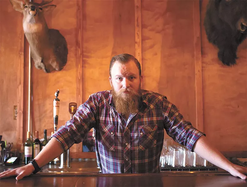 Beerocracy owner Tyler Riggs brings a wealth of beer knowledge to the new pub in the Garland neighborhood. - TESS FARNSWORTH