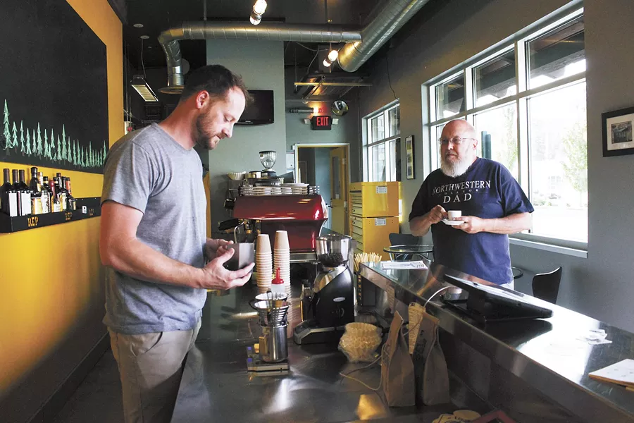 Young Bennett (left) and his wife Michal recently opened Coffee Roboto. - CARRIE SCOZZARO