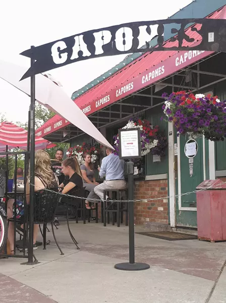 The area's name was coined at Capone's. - CARRIE SCOZZARO