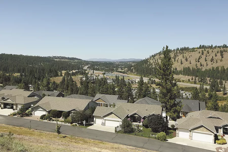 New suburban developments overlooking the valley contrast with its history as a farming area. - YOUNG KWAK