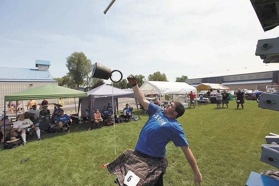 The annual Spokane Highland Games feature a number of traditional Scottish athletic events. - YOUNG KWAK