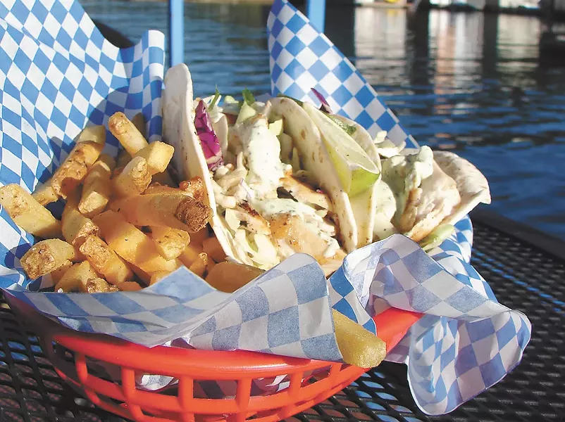 Fish tacos and fries - CARRIE SCOZZARO