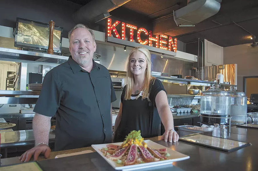Rock City Grill owner Jim Rhoades and manager Chelsea Moore. - SARAH PHILP