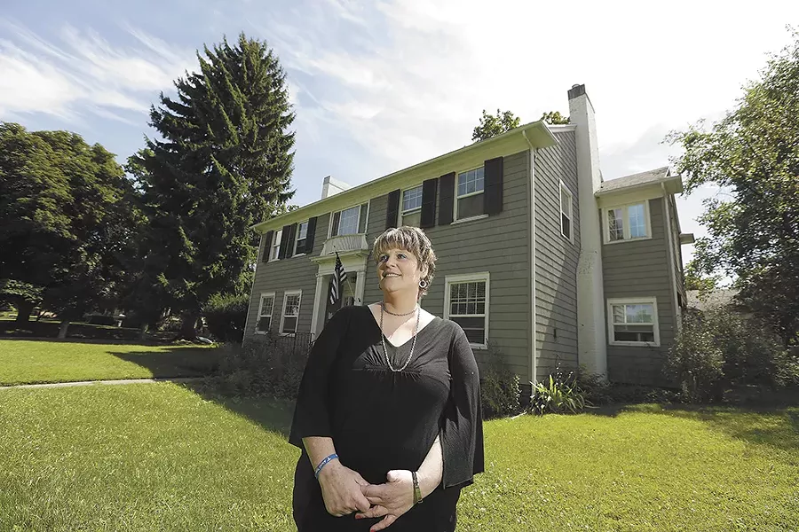 Kimberly Hoskin outside of Miryam's House, a transitional facility in Spokane, where Hoskin lived after undergoing drug treatment. - YOUNG KWAK