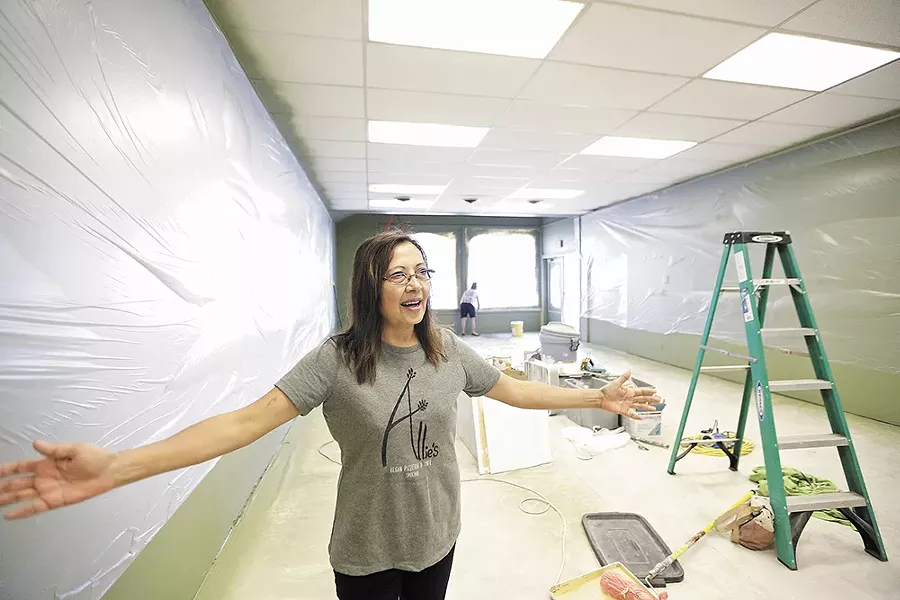 Atania Gilmore shows off the new Allie's Vegan Pizzeria & Cafe space on the South Hill. - YOUNG KWAK