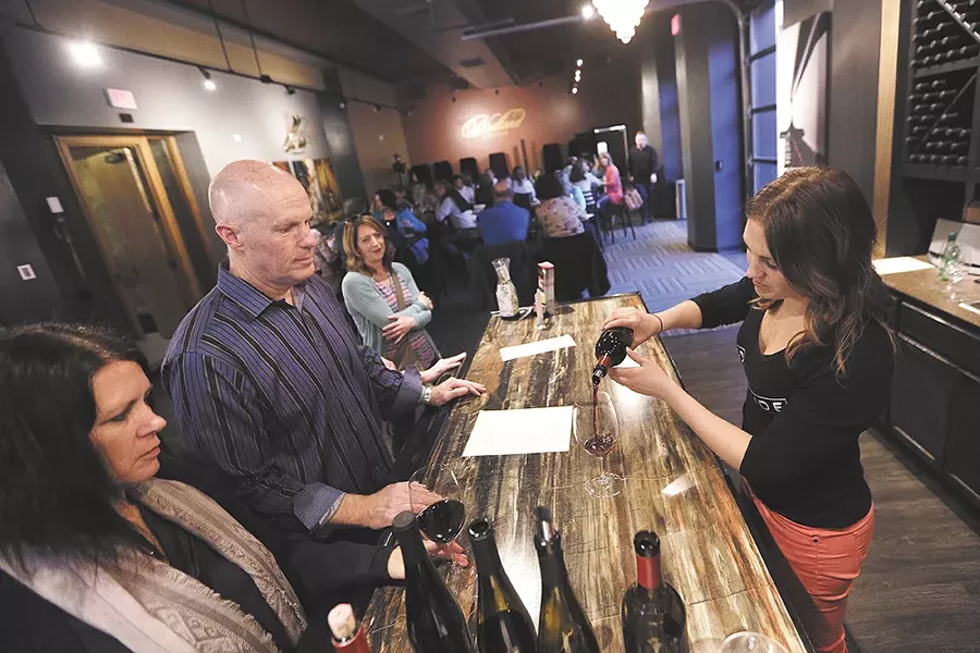 Leah Griffin pours wine at Nodland Cellars. - YOUNG KWAK