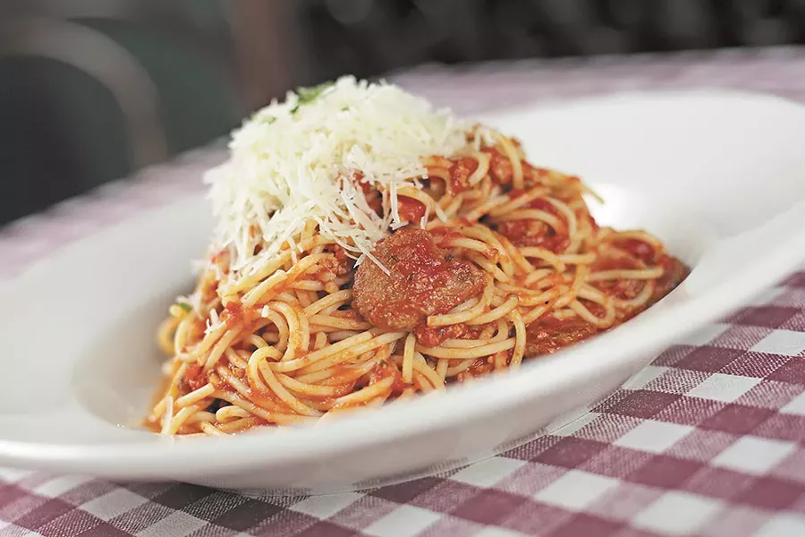 An order of Sardinia Old Fashioned spaghetti is heaped on a plate at Luigi's. - YOUNG KWAK