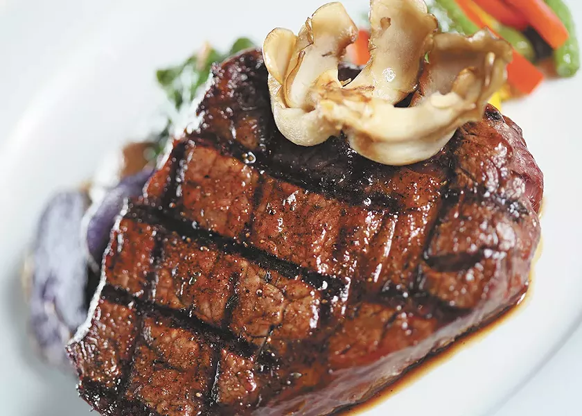A bison ribeye is perfectly prepared at Masselow’s. - YOUNG KWAK