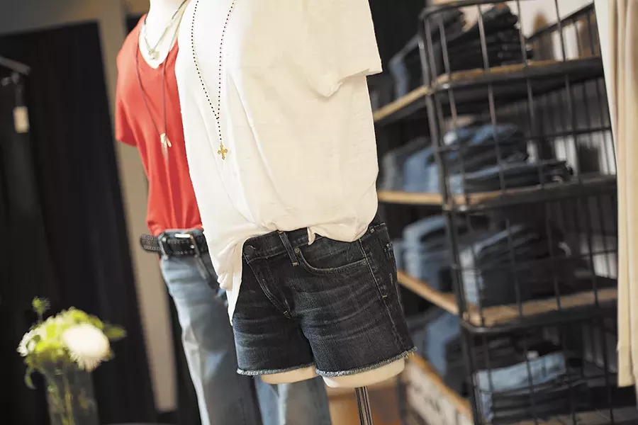 Designer jeans and tees reign at Cues. - YOUNG KWAK