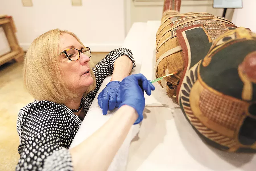 Conservator Mimi Leveque restored Annie's mummified remains in 2009 so she could be featured in the exhibit. - YOUNG KWAK