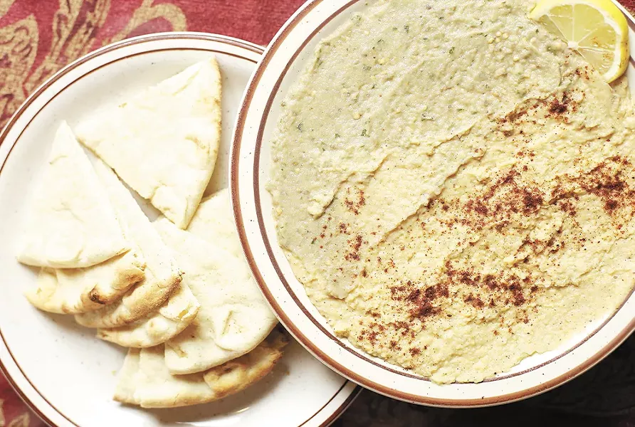 The Hummus and eggplant spread from White House Grill. - YOUNG KWAK