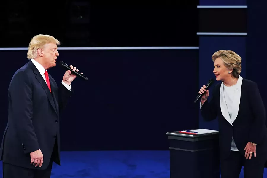 Body-language experts suggest Trump's debate moves said "I'm big, you are small."