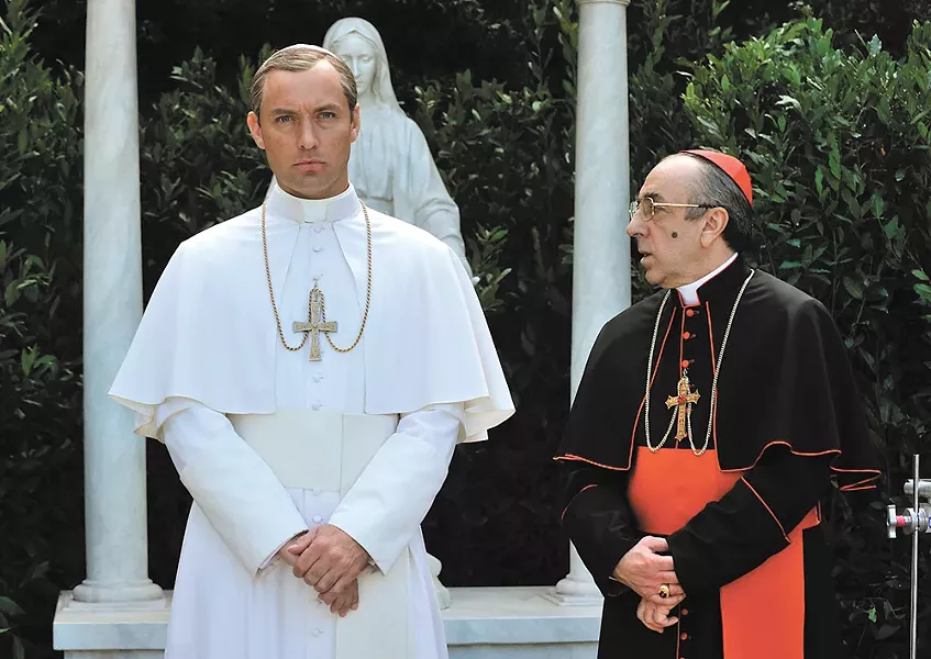 Jude Law plays a narcissistic new pope who's rattling the cages of old Cardinals, like the one played here by Silvio Orlando. - GIANNI FIORITO/HBO PHOTO
