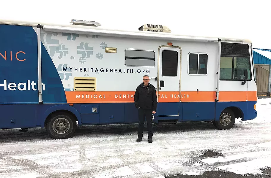 TJ Byrne and the Heritage Health mobile clinic. - MITCH RYALS