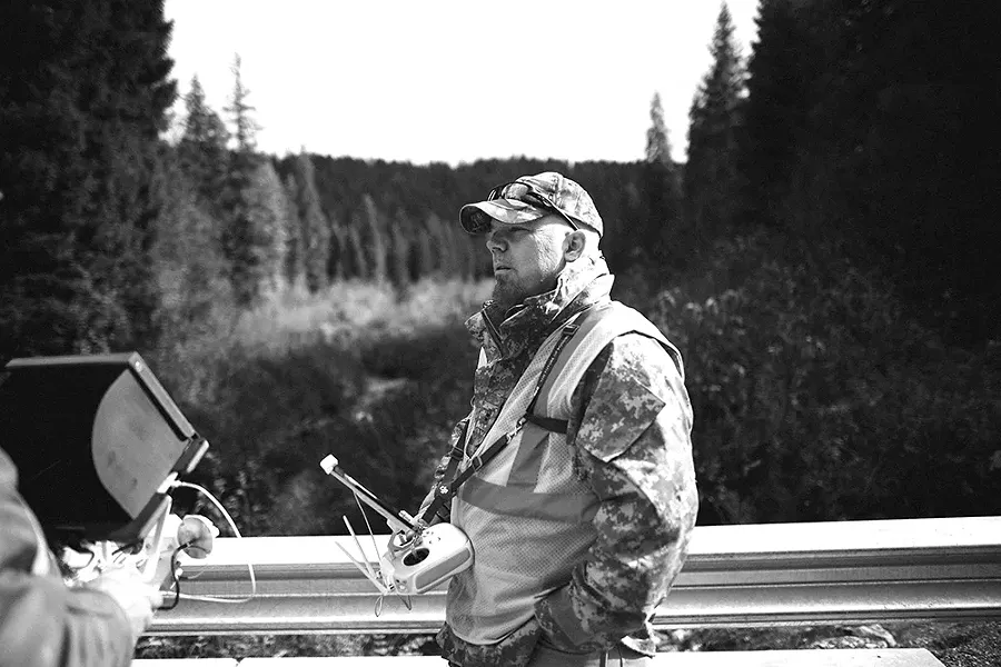 Robert Rees, founder of Rees Aerials, preps to fly a drone last fall. - COURTESY SAM MCGHEE