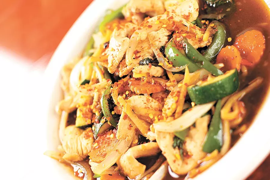 The "Spicy Old Man" (pad kra prow) is a signature dish at Sala Thai in Airway Heights. - YOUNG KWAK