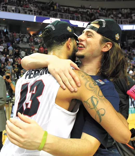 Josh Perkins (left) and Rem Bakamus celebrate the team's win vs. Xavier. - TORRY VAIL/GU ATHLETICS