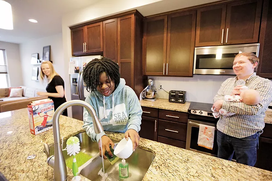 Eric Shears says cleaning the family's smaller new home is "a breeze." - YOUNG KWAK