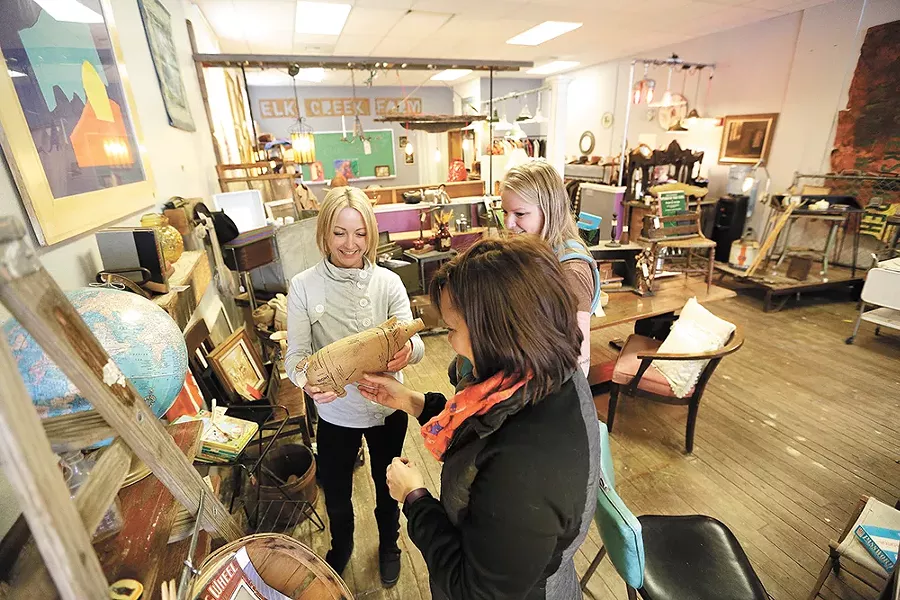 FROM LEFT: Mandi Neale, Rachell Fincher and Jessi Fincher explore the treasures found at 1889 Salvage Co. - YOUNG KWAK