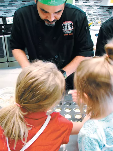 Joey Garcia teaches a class. - CARRIE SCOZZARO