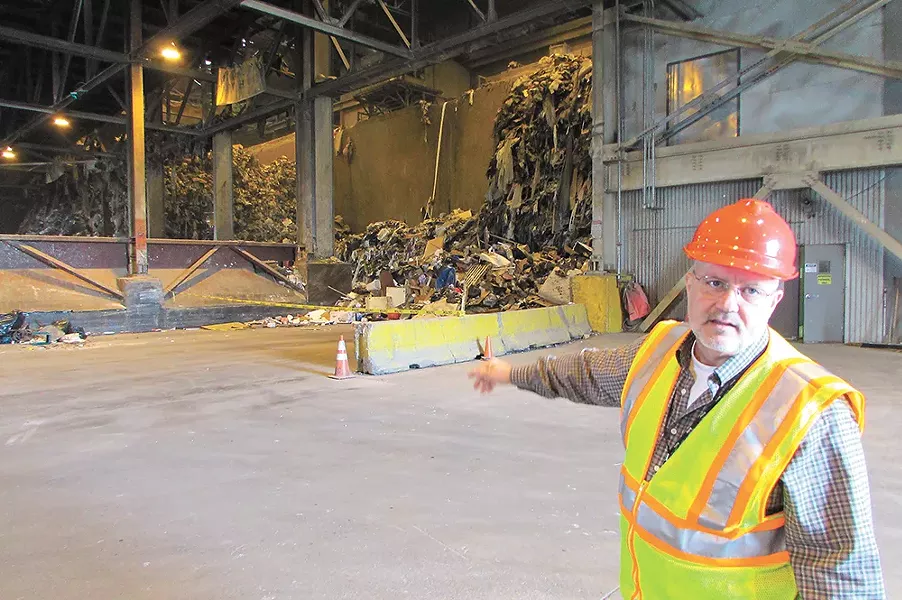 Solid Waste Disposal Director Chuck Conklin inside the Waste-To-Energy plant. - DANIEL WALTERS