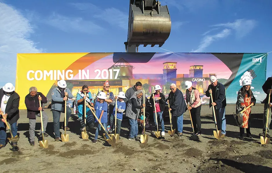 Members of the Spokane Tribe taking part in the ceremonial groundbreaking. - COURTESY OF SWINERTON
