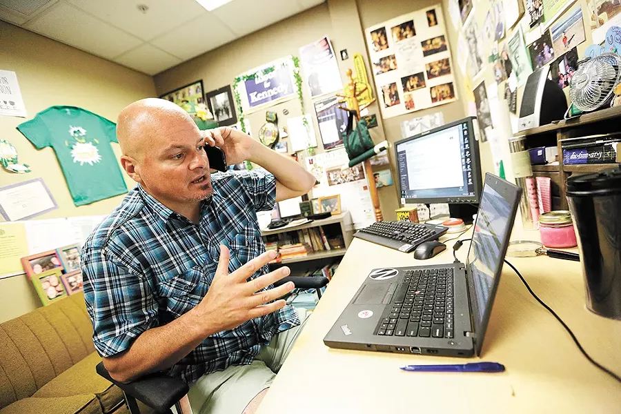 Spokane Virtual Learning teacher Henry Seipp teaches his class from a computer. - YOUNG KWAK