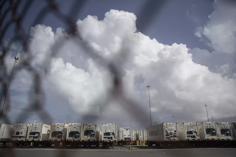 Refrigerated containers sit at the port in San Juan, Puerto Rico, Sept. 28, 2017. The Trump administration, which has insisted that its efforts in Puerto Rico have been adequate, faced increasing pressure on Thursday to mount a more aggressive response to Hurricane Maria’s devastating lashing of the island. - VICTOR J. BLUE/THE NEW YORK TIMES