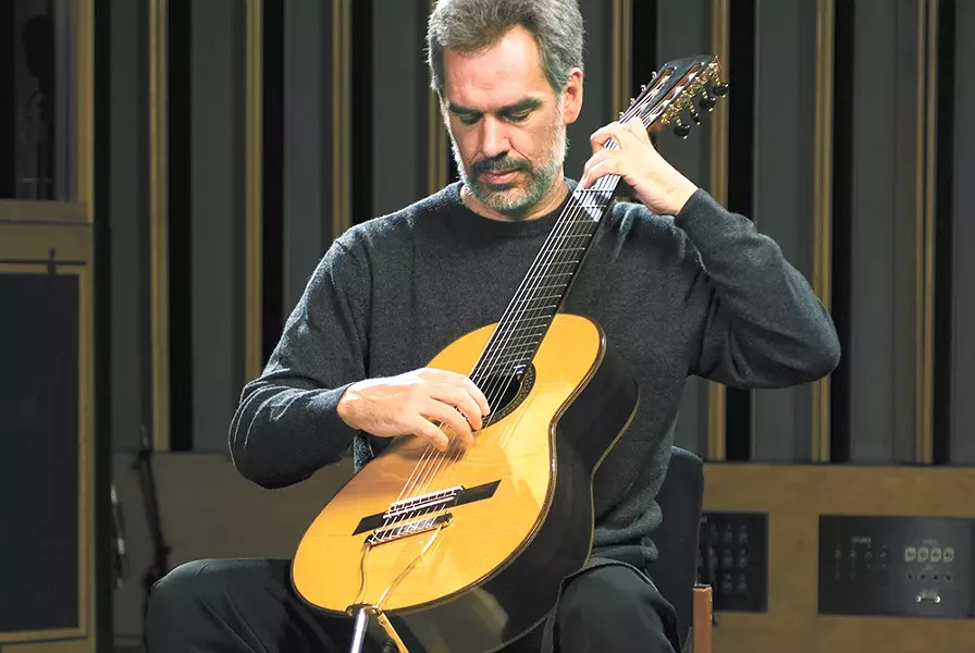 Paul Galbraith plays his eight-stringed Brahms guitar, inspired by a Renaissance-era instrument. - PETER MACKAY