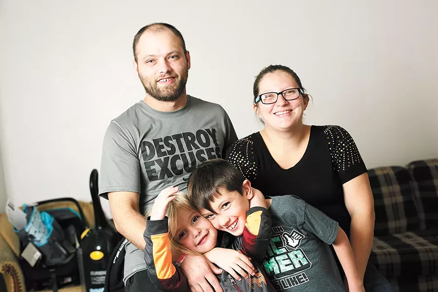 Thanks to a project by Priority Spokane, Brandon Taylor and Ashley Stannard found a home for their three kids the day before school started this fall. - YOUNG KWAK