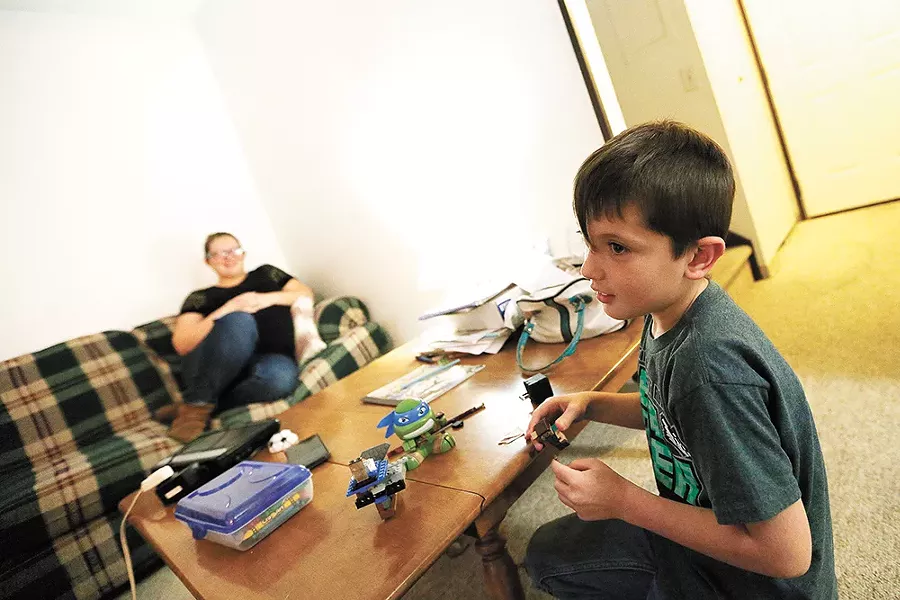 Jordan, a third-grader, says he likes having a home where he can play with LEGOs. - YOUNG KWAK