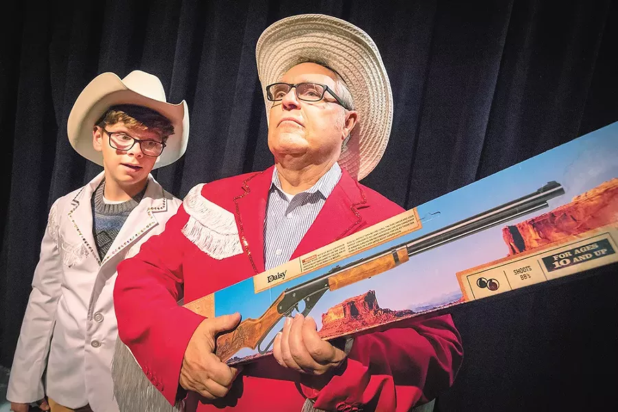 Kevon Burget (left) as Ralphie and Tom Armitage as Jean Shepherd in A Christmas Story. - JEFF FERGUSON