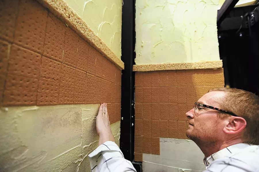 Executive sous chef Chad Wallace put up finishing touches with care. - YOUNG KWAK