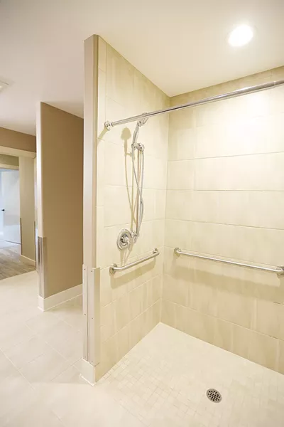 The home includes wheelchair-accessible bathrooms. - YOUNG KWAK