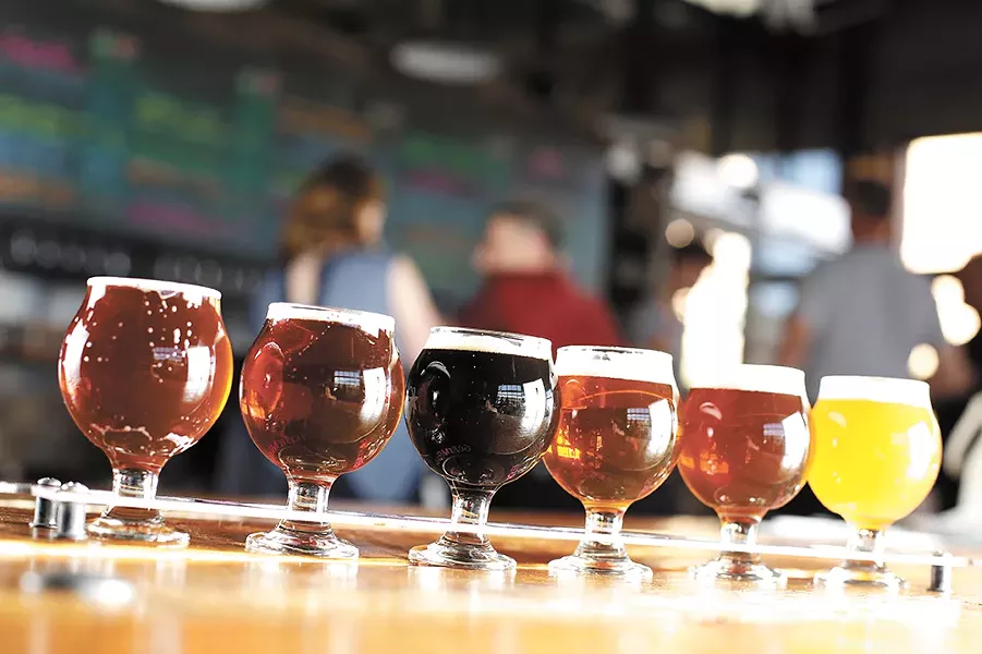 A flight of beers at Iron Goat Brewing. - YOUNG KWAK