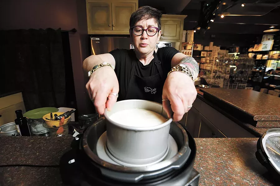 Marilee Kinsella uses her pressure-cooker to make cheesecake. - YOUNG KWAK