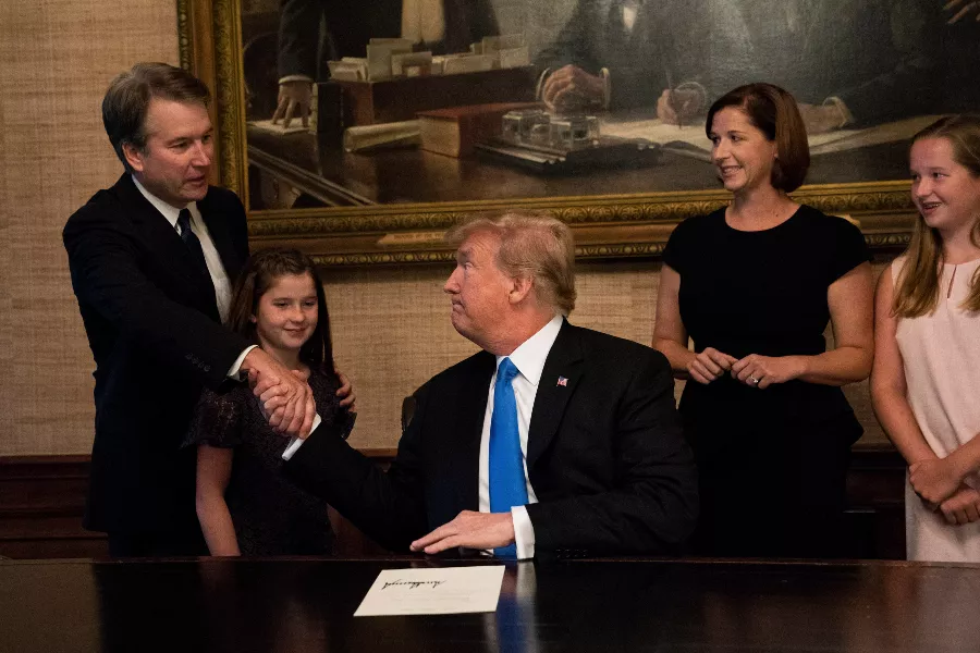 President Donald Trump with Judge Brett Kavanaugh, his nominee for the Supreme Court, and Kavanaugh's wife, Ashley, and their daughters in the residence of the White House in Washington, July 9, 2018. - DOUG MILLS/THE NEW YORK TIMES