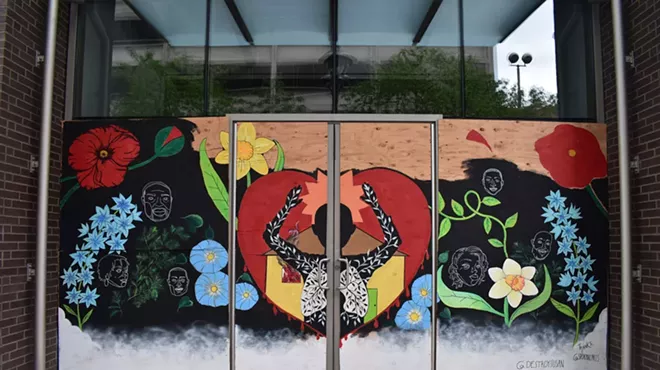 Susan Webber and Shelby Allison worked with Spokane Arts and the Nike store to create this mural, seen here as a work in progress, in downtown Spokane.