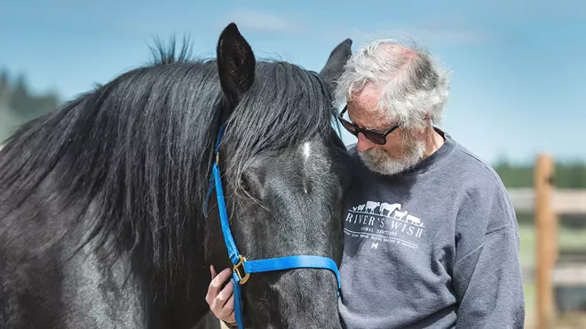 Paloma the horse and Pete Jagoda at River’s Wish Animal Sanctuary.