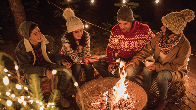 Maintain social distance at your outdoor gathering by seating family members together on one side of your fire.