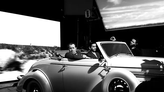 Gary Oldman (left) plays Mank, hard-drinking screenwriter of the classic Citizen Kane.