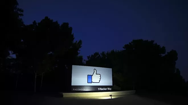 The sign outside Facebook's headquarters in Menlo Park, Calif., July 15, 2020. The Federal Trade Commission and 48 states accused Facebook on Wednesday, December 9, of becoming a social media monopoly by illegally squashing competition by buying up its rivals.