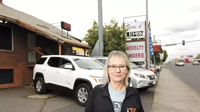 Kim Arrotta, co-owner of Northtown Auto Sales, was frustrated that a next-door business, a sex shop, remained open throughout the spring shutdown.