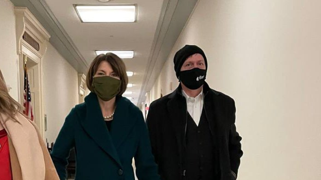 Spokesman-Review Editor-in-Chief Rob Curley sporting a Spokesman-Review-branded mask attends the inauguration as the guest of Rep. Cathy McMorris Rodgers, R-Washington.