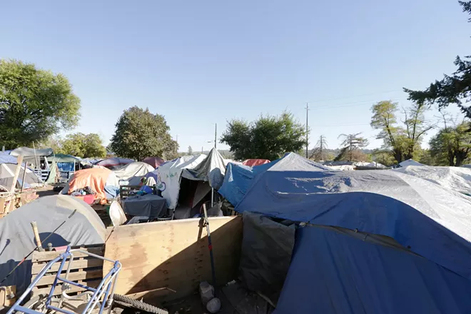 Two divergent, contradictory plans will determine the future of Camp Hope. As a cold winter and the specter of sweeps loom over the camp, its residents wonder what comes next. - Vimarsana News