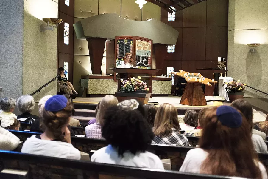 University High School 10th-grader Easton Benson, winner of the Eva Lassman Memorial Creative Writing Contest, High School Division, reads her story. - YOUNG KWAK