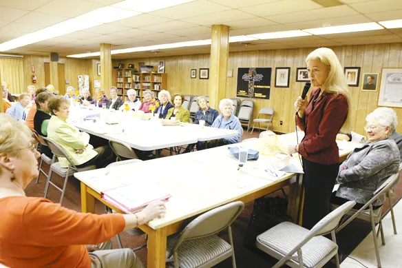 Verner has made the rounds, delivering bad news about the city's budget, as she did recently to the Altar Society of St. Anthony's Church. - YOUNG KWAK