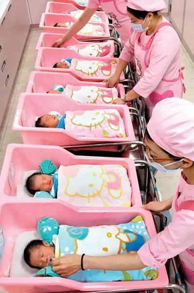With one of world’s lowest infant mortality rates, the Japanese are among the planet’s healthiest people. And their health care costs are nearly a third the costs for Americans. - SAM YEH PHOTO/AFP/GETTY IMAGES